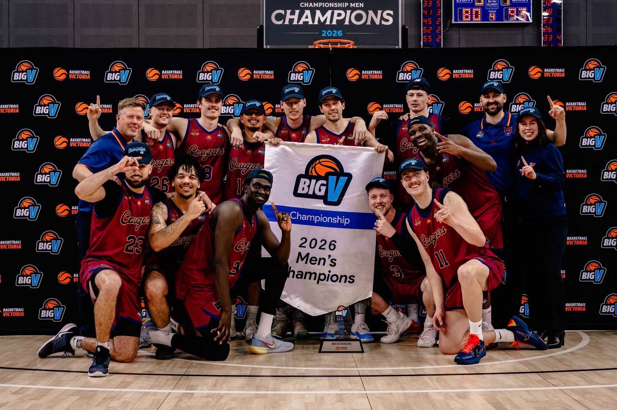 McKinnon Cougars men celebrating the 2026 Big V Championship