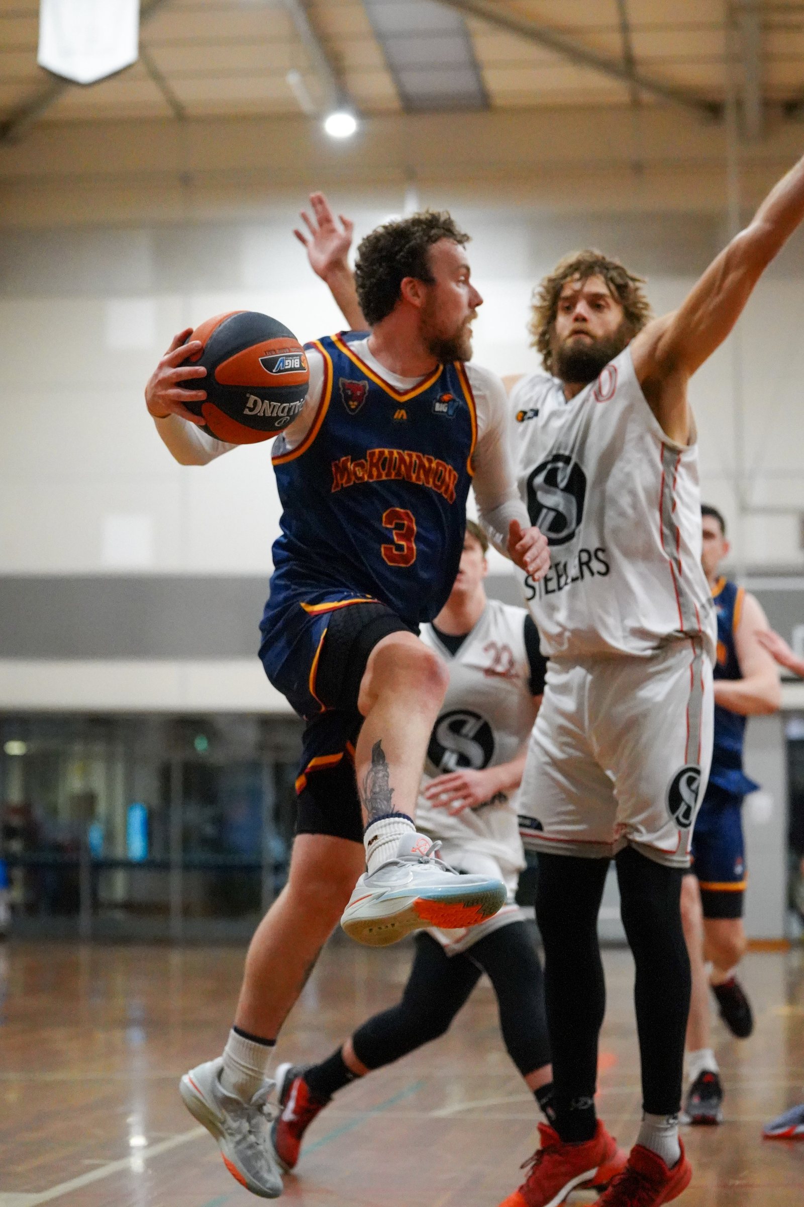 McKinnon player driving to the basket
