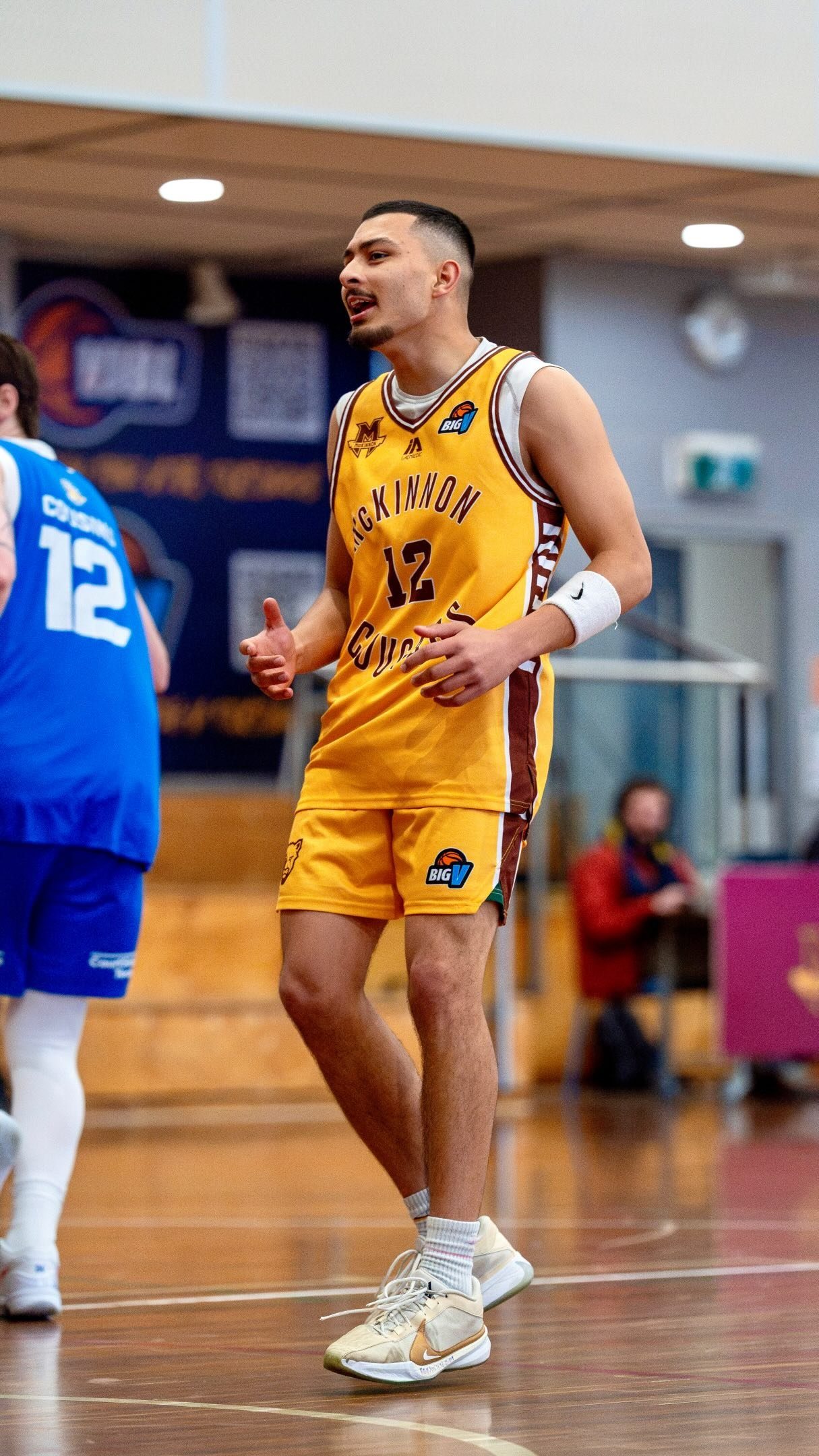 McKinnon Cougars player in the gold strip