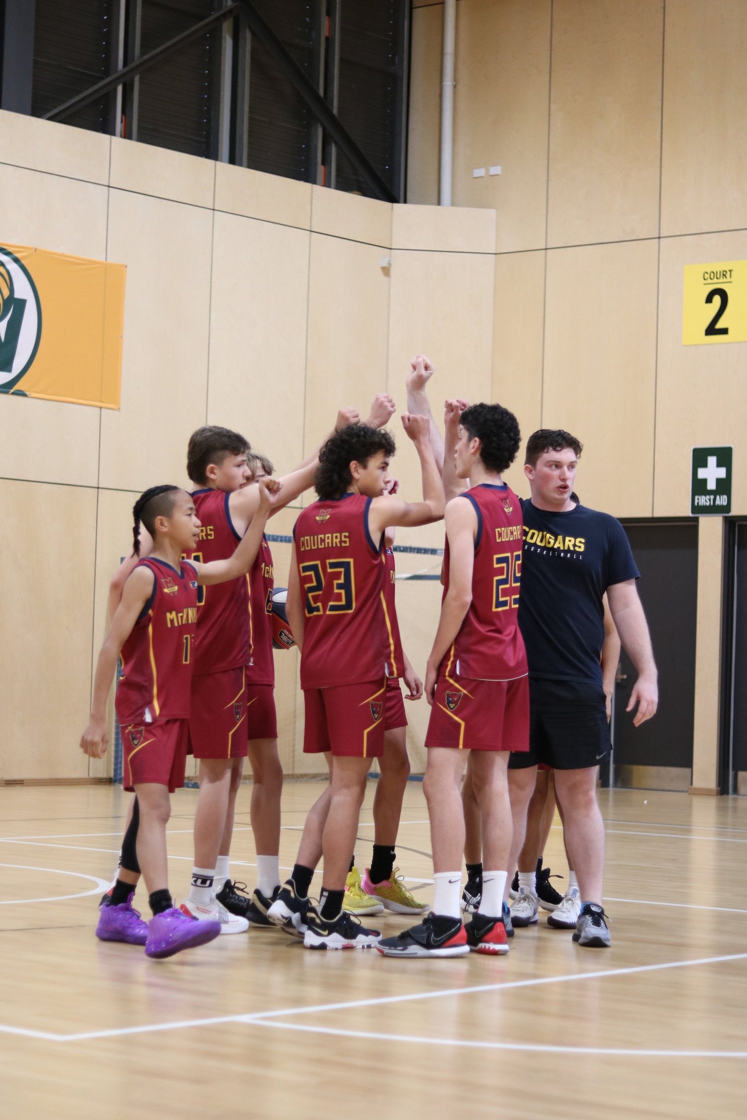 A Cougars team huddle
