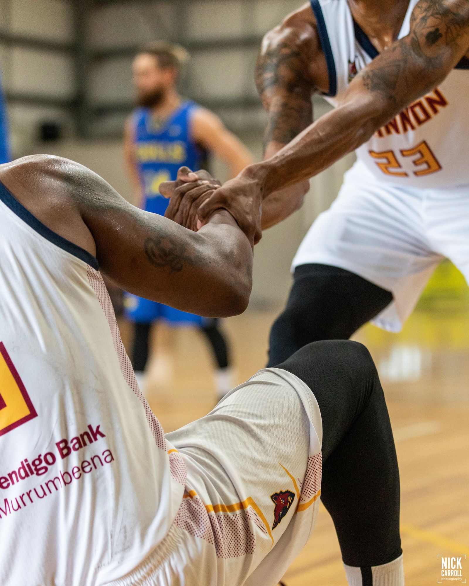 A McKinnon player driving to the basket